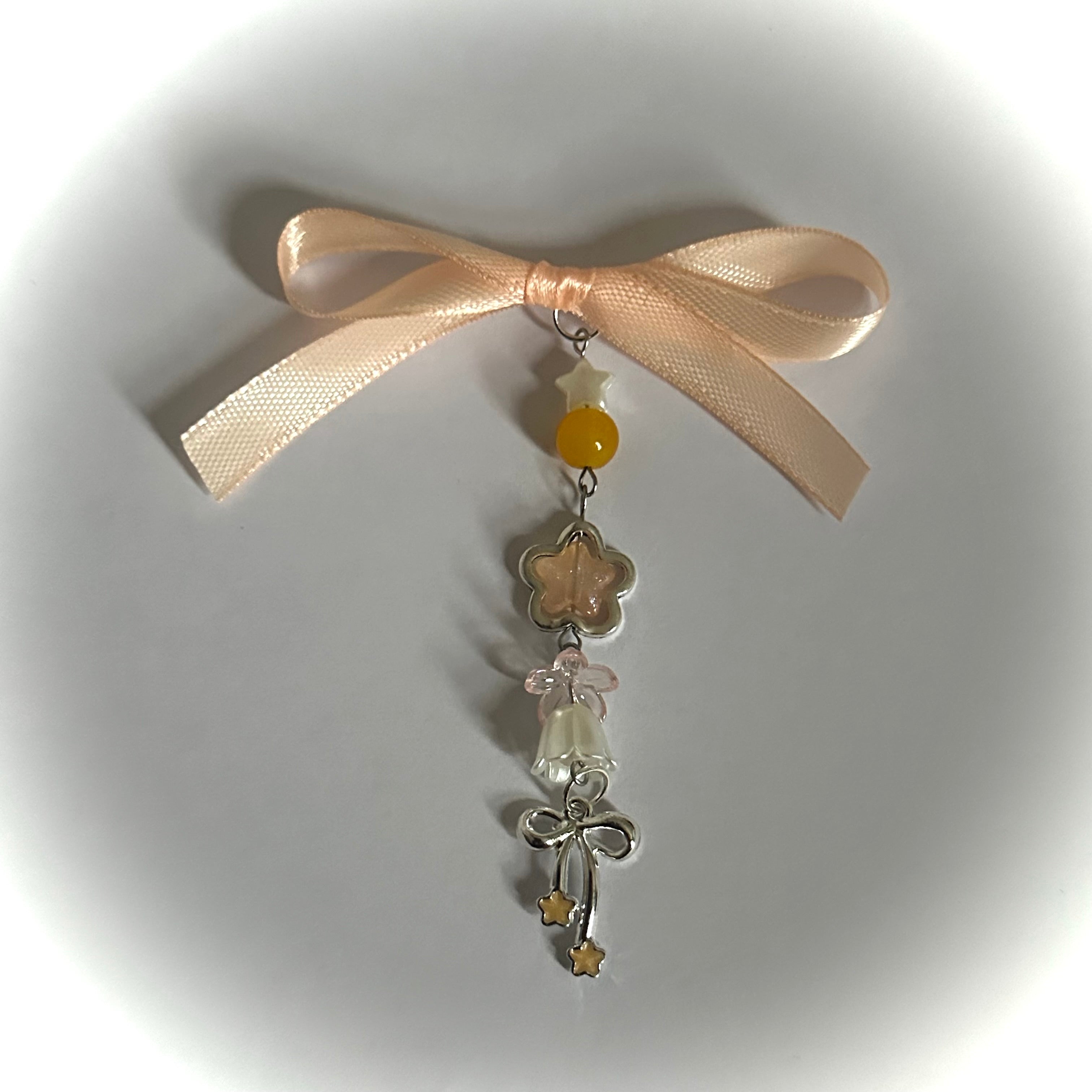 Orange angel bow charm 🪽